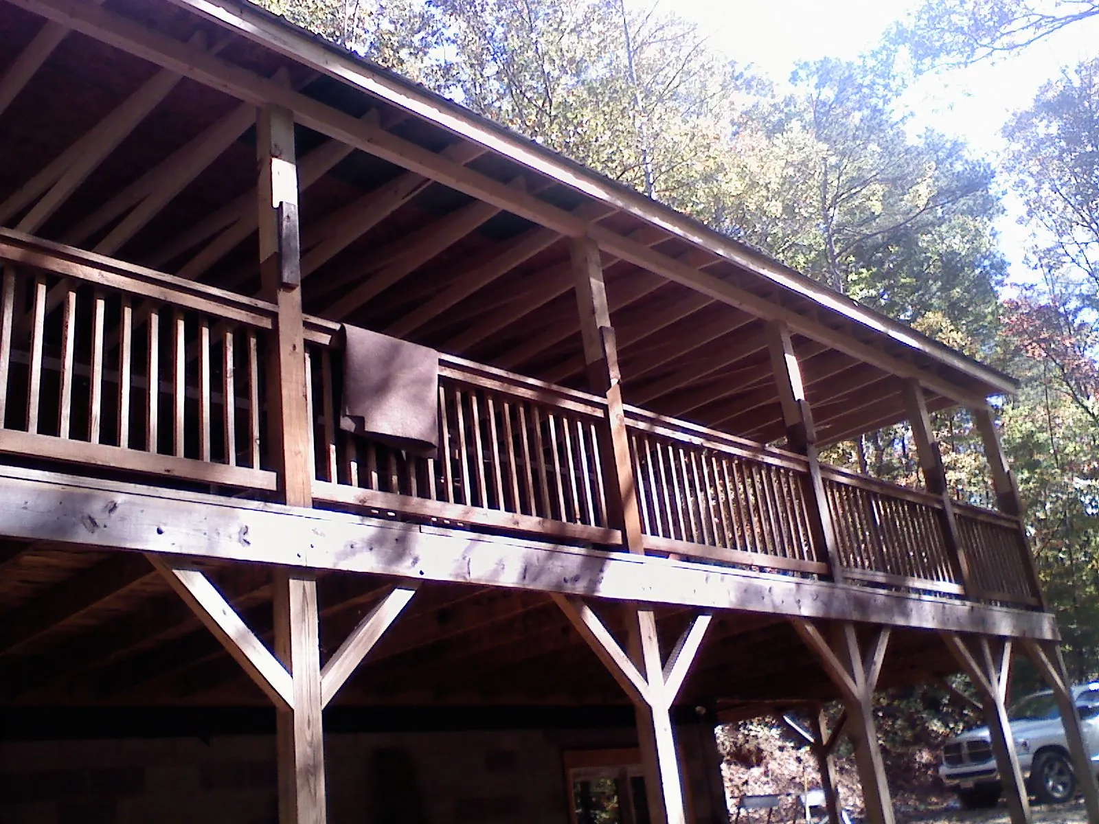 Timber framing under a new elevated porch and deck — Roof Leak Repair in Colleyville by Roofing Brothers